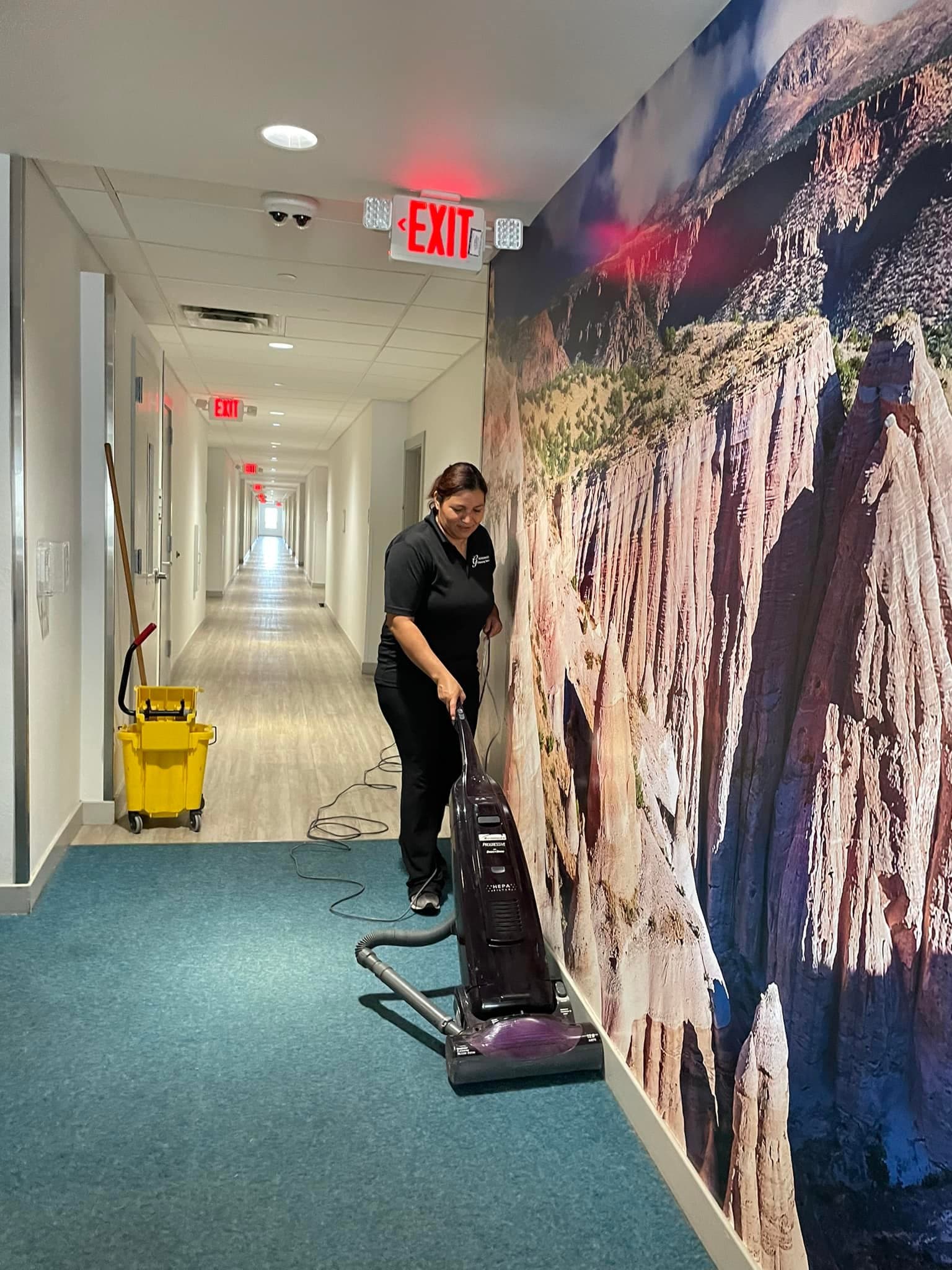 Irene Gonzalez cleaning office space